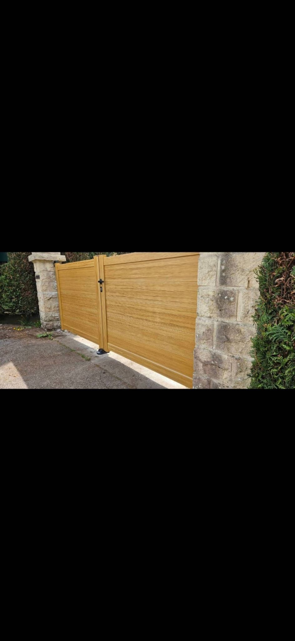 Vente de portail aluminium imitation bois à Carpiquet